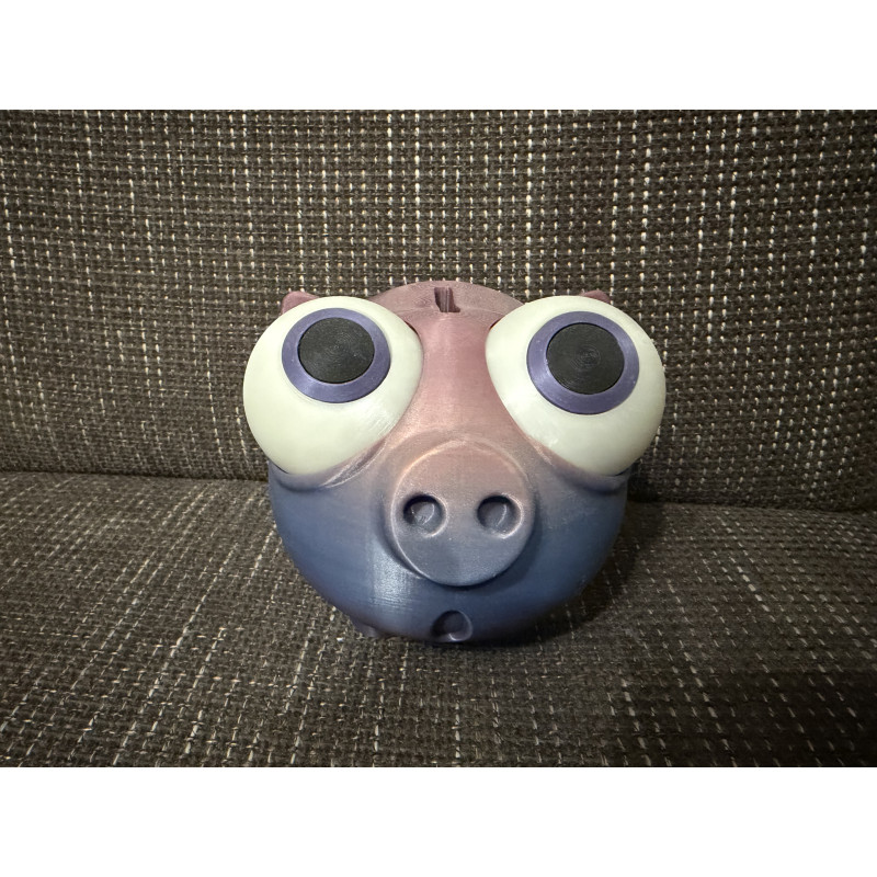 Nachtleuchtendes Sparschwein mit großen Augen und Drehverschluss unten
